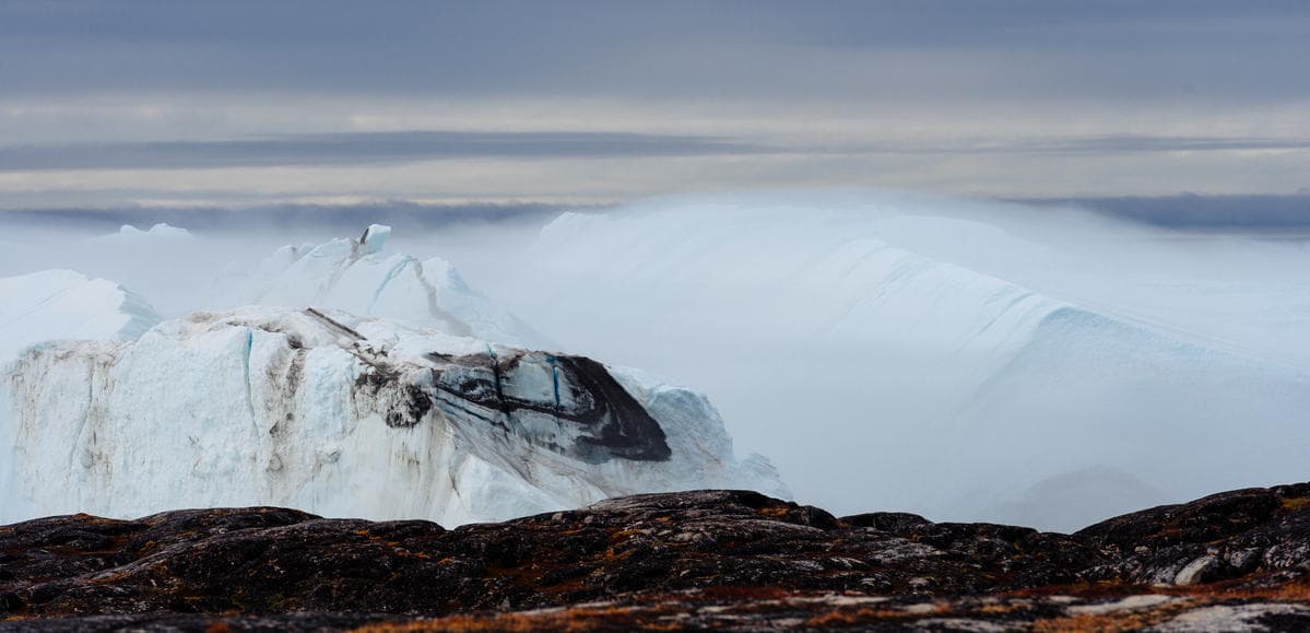 Black soot on icebergs near Greenland.