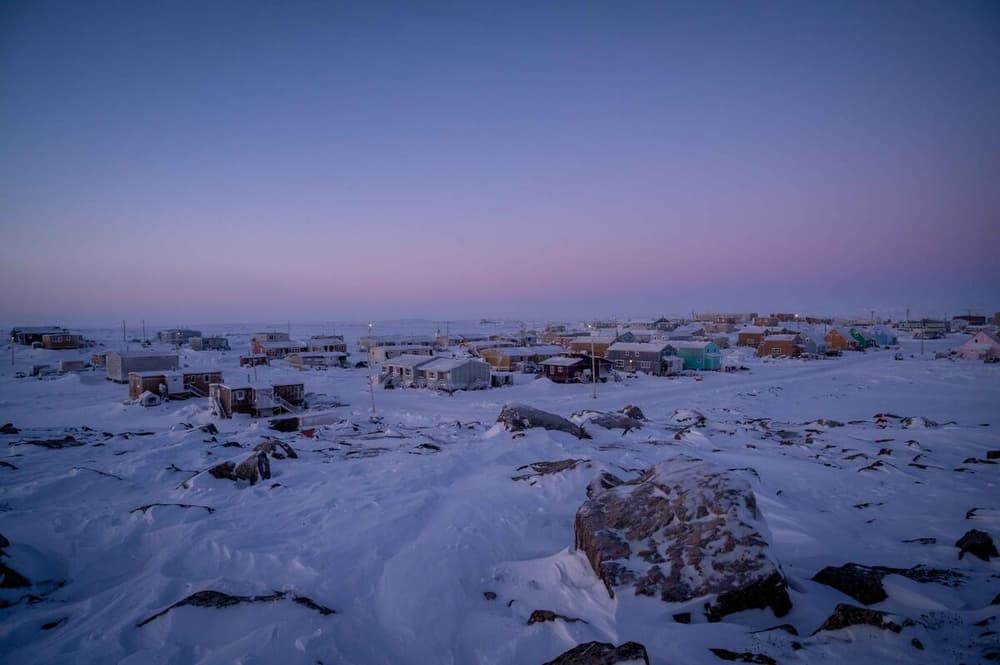 Sundown across the town of Taloyoak, located in the Kitikmeot region of Nunavut.