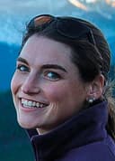 Anna Brose, wearing sunglasses on their forehead